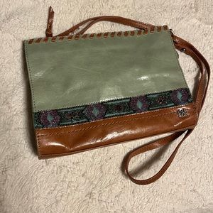 Green and beaded The Sak crossbody bag.